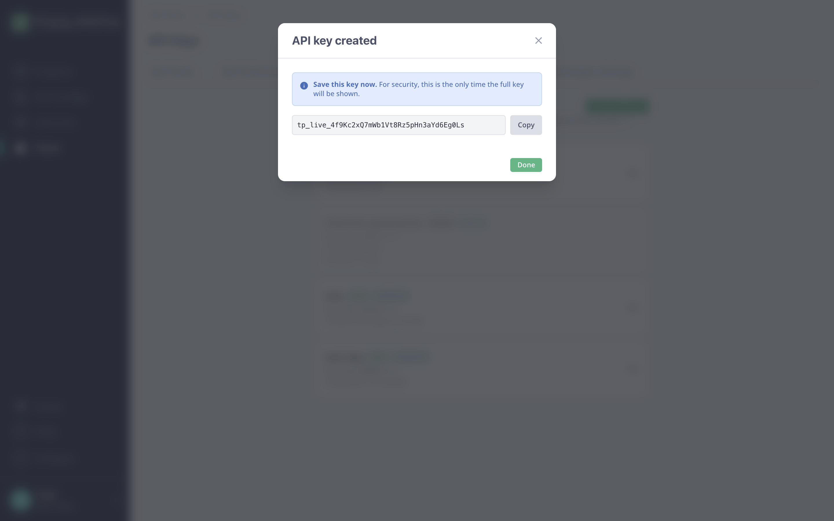 The API key created dialog, which displays the full key only this once